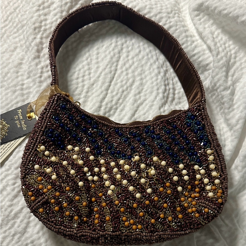 From India to you brown beaded half moon shoulder bag